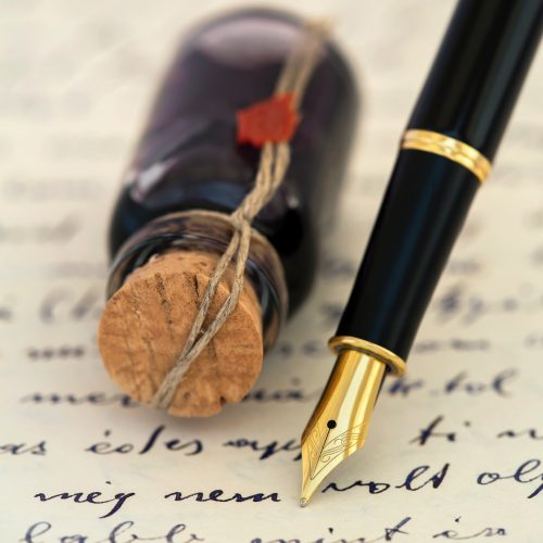 Fountain pen on a handwritten letter